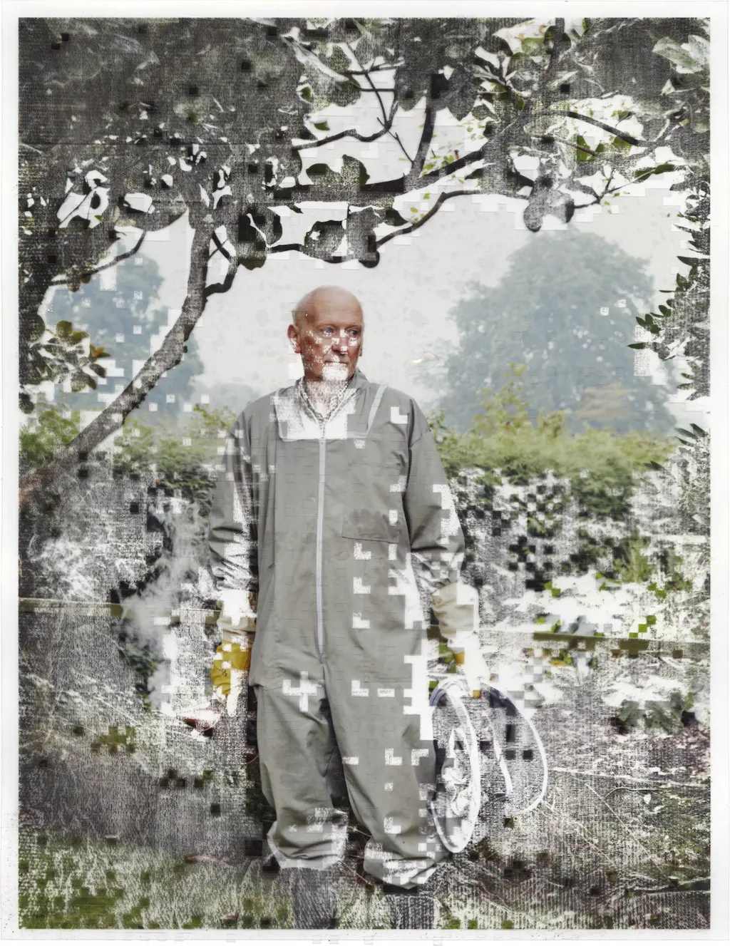 A beekeeper is standing aloof in his garden. His face, body, and surroundings are eroding away around him. Machine cut transparent vinyl has been used as a mask for the acetate bath this image has taken, the paper towels used to dry it off have left textured marks on the exposed plotter ink.