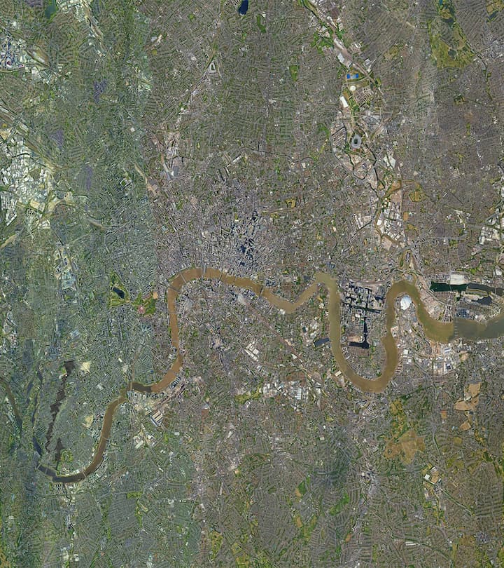 Triplet of images, starting with a satellite view of London, unaltered in the first frame, the image then undergoes a striking transformation, compressing horizontally, and with the transformation the city’s greenery—parks, forests, and other natural areas—seemingly dissolves away as if subtly edged out of existence. This visual shift represents a real-world human mindset: the prioritization of human living space over natural landscapes. When the image expands, revealing newfound space, the instinct isn't to restore nature. Instead, it's seen as room for more urban development, reinforcing the narrative of human dominance and expansion over nature.